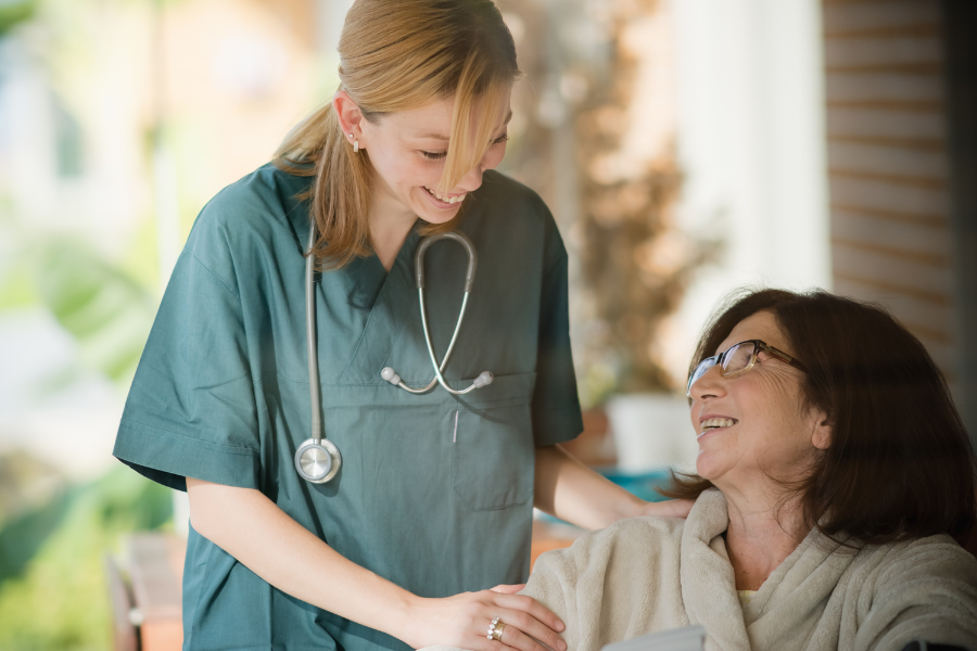 Home Care in Bonita Springs (3) Home Care in Bonita Springs, a care giver assists an elderly woman at her home.