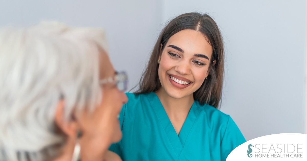 A caregiver smiles with an older client showing the results of successfully starting a new caregiving job.