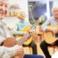 A group of seniors enjoy playing instruments together showing the impact of music for older adults.