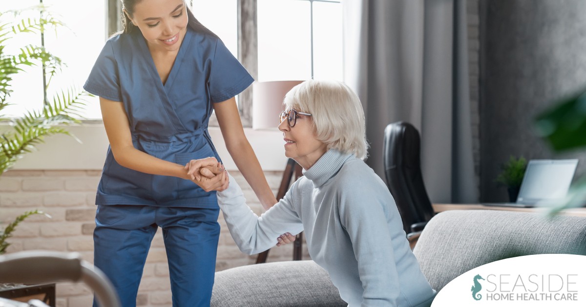 A caregiver demonstrates her caregiver skills by helping an older adult get up.